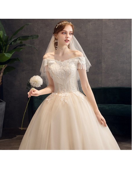 New trailing champagne color wedding dress